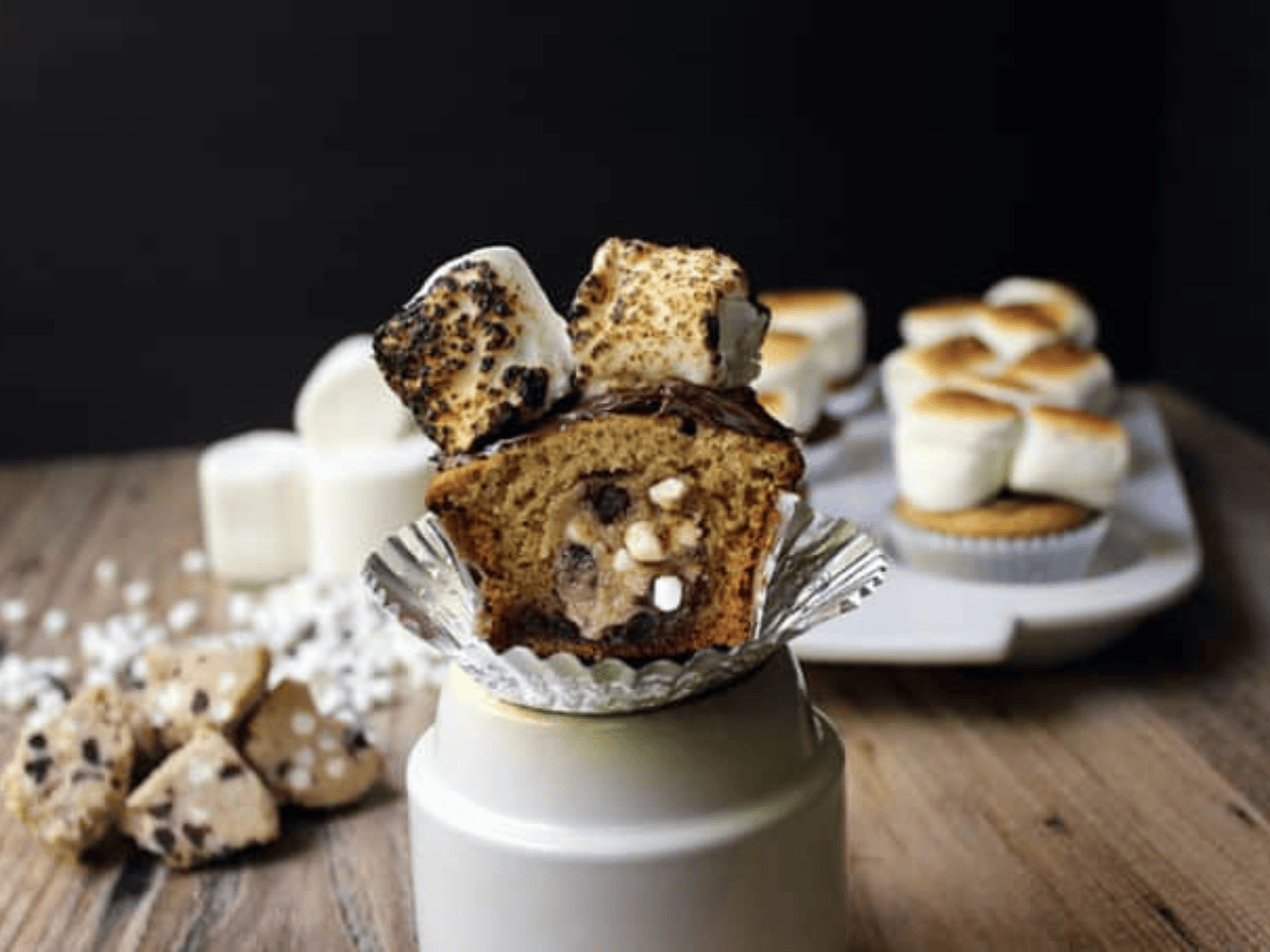 Close of sliced dessert showing eggless dough on stand