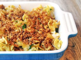 Baked with lots of Parmesan cheese, this pasta is full of classic Caesar salad flavors and topped with a deliciously rich buttery cracker crust. You can also serve this pasta unbaked as a pasta salad at a picnic!