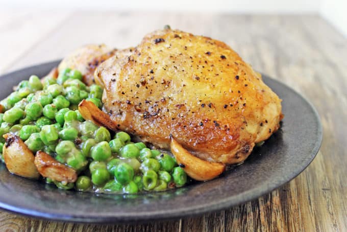 plated chicken and peas