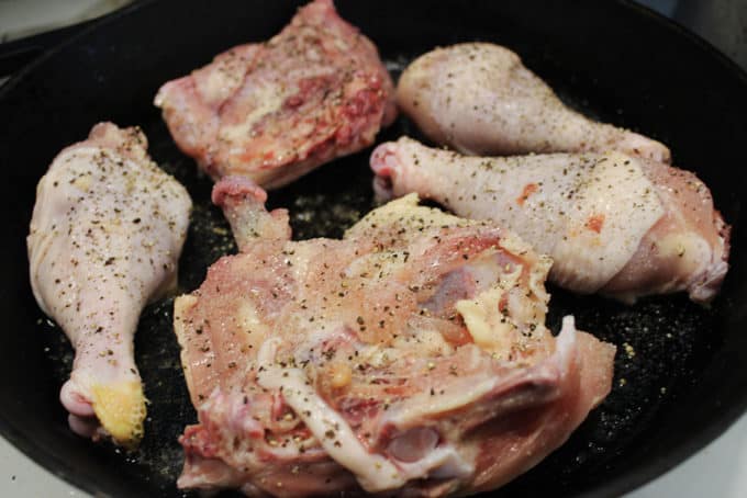 raw chicken in cast iron