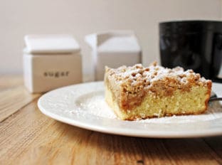 Delicious, classic NY Crumb Coffee Cake just like the kind you would find in your favorite coffee shop, a tender cake topped with large chunks of cinnamon sugar goodness!