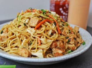 CPK Thai Peanut Chicken Pasta made with chicken, vegetables, and a honey-peanut sauce, this California Pizza Kitchen dish is easy to make at home.