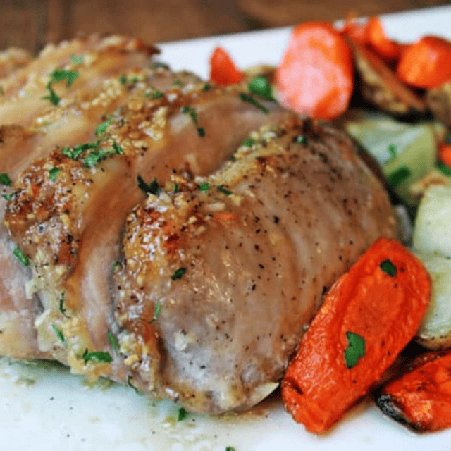 pork plated with mixed veggies