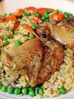 One pan easy baked Chicken Brown Rice Casserole served with Carrots and Peas. Healthy, flavorful and almost no clean-up involved!