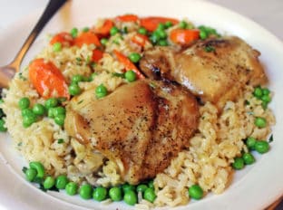 One pan easy baked Chicken Brown Rice Casserole served with Carrots and Peas. Healthy, flavorful and almost no clean-up involved!
