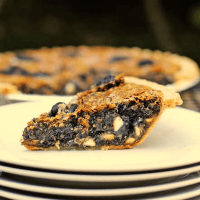 Pie on stack of plates