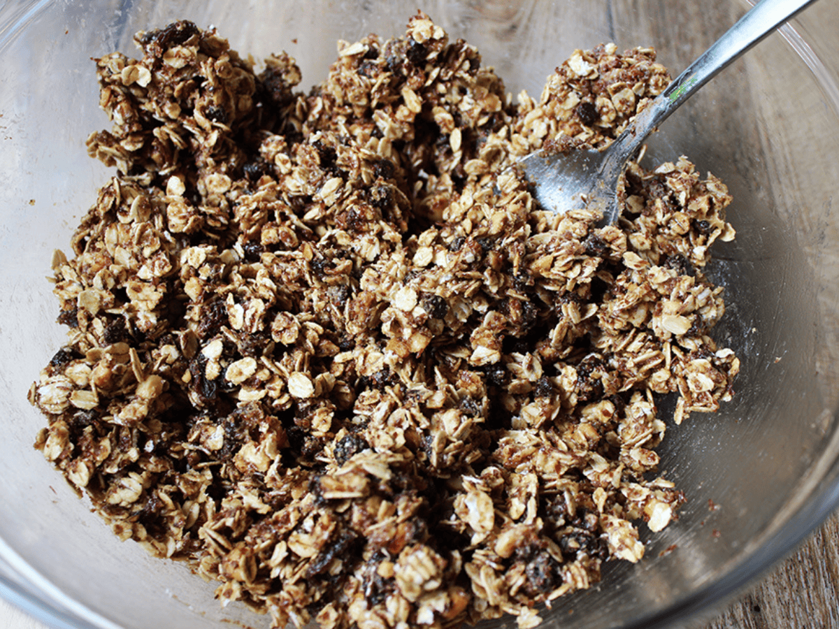 Closeup of ingredients mixing in a bowl with a spoon