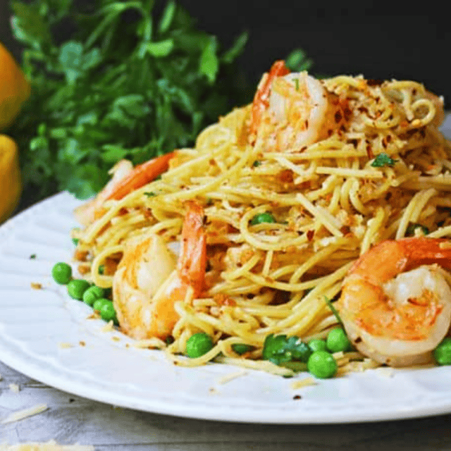 Shrimp pasta on white plate