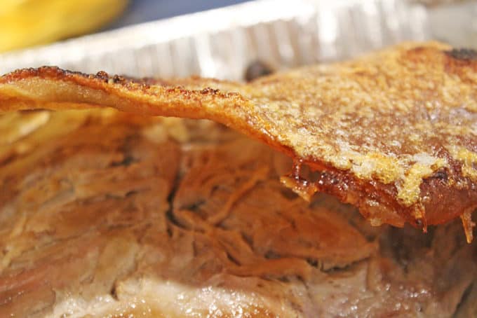 Close up of pork shoulder in pan