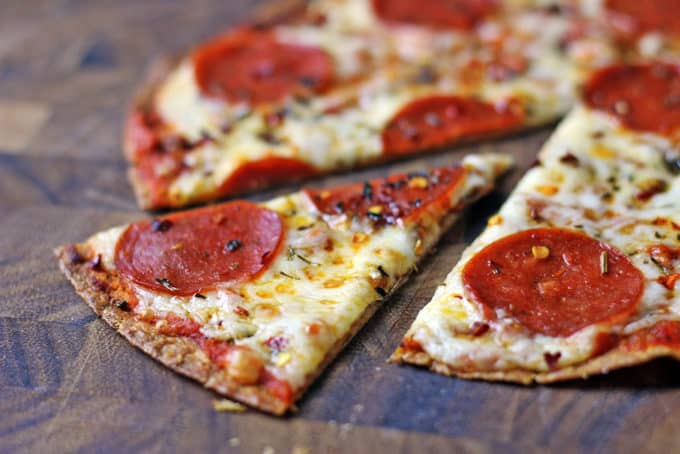 Weight Watchers Pepperoni Pizza baked on a whole wheat tortilla with melty mozzarella and pepperoni, this pizza is one of the most satisfying ways you can enjoy a 6 point meal!Â 