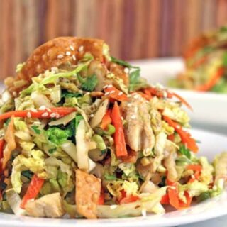Salad in a white bowl.