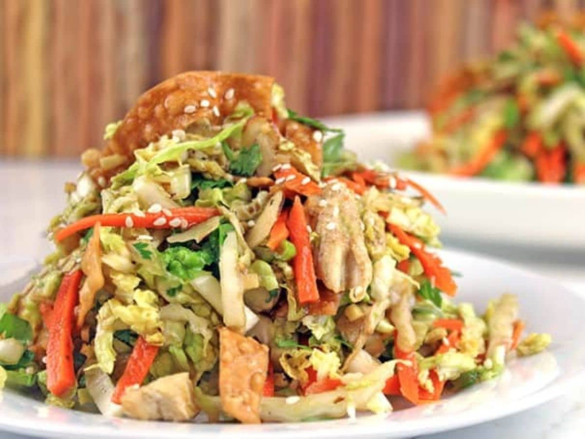 Salad in a white bowl.