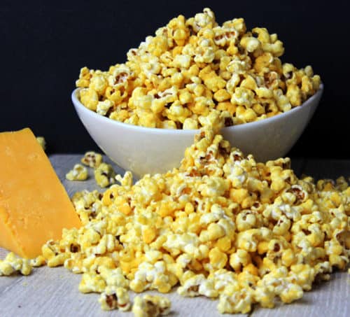 Easy Homemade Cheddar Cheese Popcorn! Just like the kind you buy in tins at Christmas. The best part is it takes just five minutes to make and is done 100% in the microwave!