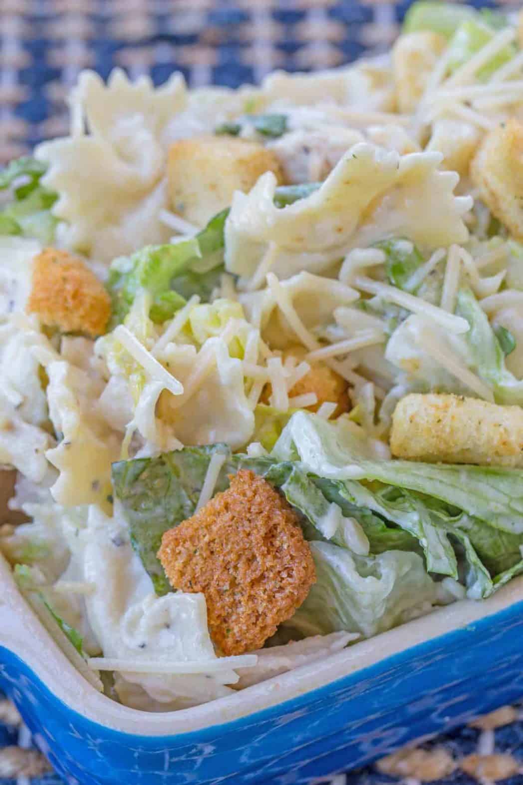chicken caesar pasta salad with croutons and cheese