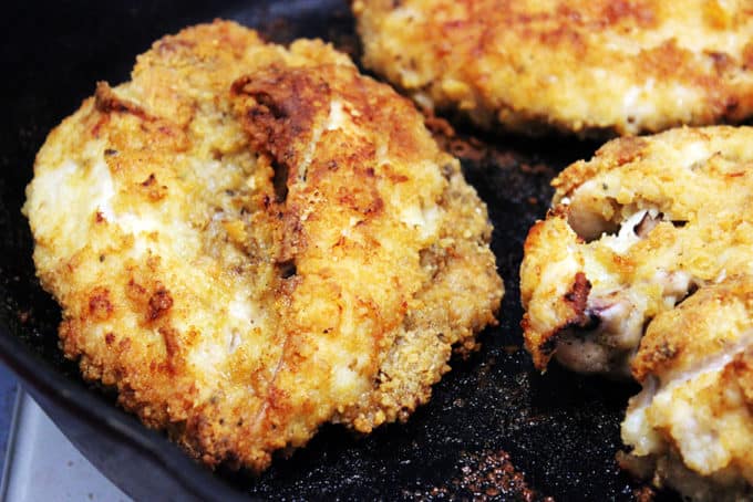 Crunchy Buttermilk Oven Fried Chicken that is made with skinless chicken breast and coated in saltines makes for the most surprising, amazing "fried" chicken you'll eat. The fact that it is both a "light" recipe and cooked in butter makes it truly AMAZING.