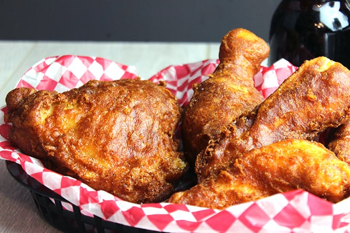 Pioneer Fried Chicken in a basket with red checkered paper