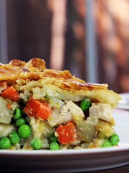 Full of grilled chicken, caramelized carrots, potatoes, celery with a delicious homemade creamy chicken sauce (with no cans of soup!), it is baked inside a delicious pie crust for a fantastic dinner that will be enjoyed by all!