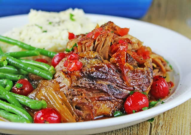 plate of cherry flavored pork with veggies