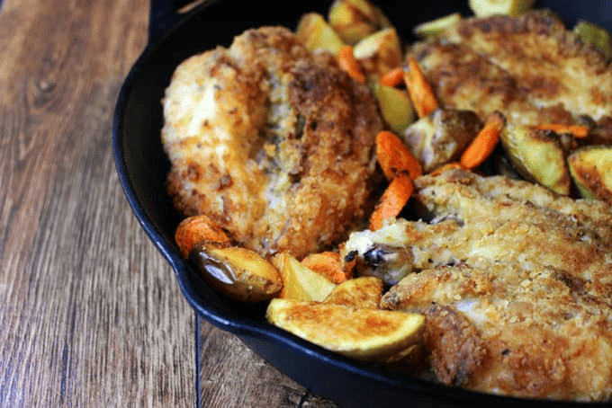 Crispy chicken and veggies in a pan