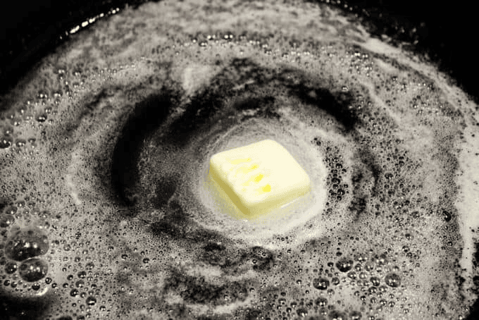 Butter melting in a pan