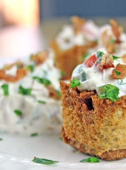 These little BLT bites are full of your favorite Bacon, Lettuce & Tomato Sandwich flavors in a small crispy bread cup. Made with cream cheese, sour cream, tomatoes, bacon and parsley, they are a fantastic holiday or football party food!