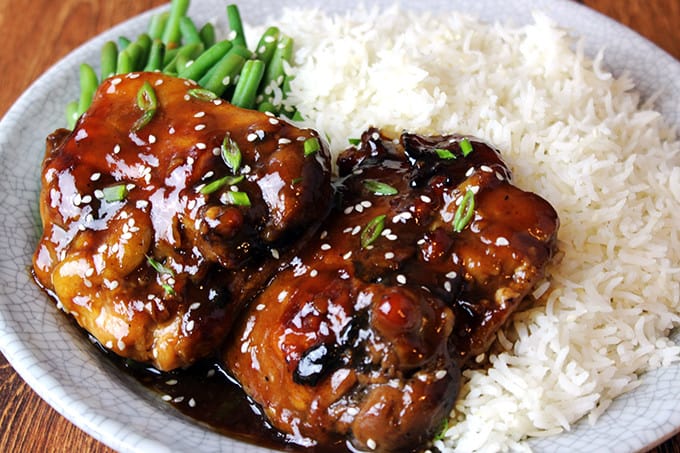 baked chicken teriyaki on bed of rice and green beans