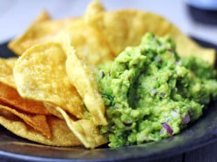 You've had the Barbacoa Beef Burrito, now you can enjoy the Chips and Guacamole that go with it! Salty Lime Tortilla Chips just like you love at Chipotle served with their authentic guacamole. You'll never want premade chips or dip again!