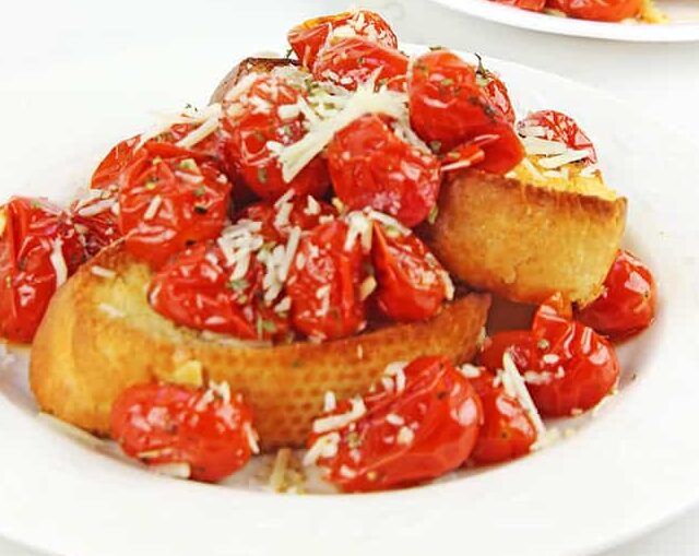 two plates of Roasted Garlic Tomatoes
