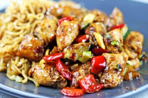 Full of Spicy Wok fired Chicken Breast, Zucchini, Red Bell Peppers and crunchy Peanuts in a Sesame Ginger-Garlic Sauce, this recipe is Authentically Panda Express! The recipe is straight from the source! http://archives.starbulletin.com/2007/01/17/features/story01.html BACK TO TOP art CRAIG T. KOJIMA / CKOJIMA@STARBULLETIN.COM Panda Express customer favorite Kung Pao Chicken. CLICK FOR LARGE Kung Pao Chicken is tasty, too No luck getting that Orange Chicken recipe, but Panda was willing to part with another of its top dishes. Kung Pao Chicken 1 pound boneless, skinless chicken breast, diced into 1/2-inch pieces, rinsed and drained 1 teaspoon cooking wine 2-½ tablespoons soy sauce ⅓ cup water 2-½ tablespoons vegetable oil, divided use 12 whole dry chili peppers (smaller than 3 inches; if longer, cut in half) ¼ cup diced green onion, white part only, in 1/2-inch pieces 1 teaspoon ground ginger 1 teaspoon ground garlic 1 teaspoon crushed red chili pepper ½ tablespoon cornstarch mixed with ½ tablespoon water 1 teaspoon sesame oil 2 ounces dry roasted peanuts » Marinade: ¼ cup water ½ teaspoon salt ½ egg ¼ cup cornstarch 2 tablespoons vegetable oil Combine marinade ingredients. Add chicken; refrigerate at least 1 hour. Combine wine, soy sauce and water; set aside. Heat wok on high heat 10 seconds. Add 2 tablespoons oil and heat well. Remove chicken from marinade and add to wok. Stir-fry quickly, 60 seconds. Remove chicken; drain well. Add chili peppers. Stir-fry until they darken. If wok becomes too dry, add ½ tablespoon vegetable oil. Add green onions, ginger, garlic and crushed red chili pepper. Stir-fry 5 seconds. Return chicken to wok; stir soy sauce/wine mixture and add; stir until sauce boils, then add cornstarch mix to thicken. Add sesame oil and peanuts. Stir and fold until ingredients are thoroughly mixed. Serves 3.