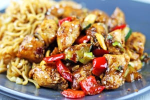 Full of Spicy Wok fired Chicken Breast, Zucchini, Red Bell Peppers and crunchy Peanuts in a Sesame Ginger-Garlic Sauce, this recipe is Authentically Panda Express! The recipe is straight from the source! http://archives.starbulletin.com/2007/01/17/features/story01.html BACK TO TOP art CRAIG T. KOJIMA / CKOJIMA@STARBULLETIN.COM Panda Express customer favorite Kung Pao Chicken. CLICK FOR LARGE Kung Pao Chicken is tasty, too No luck getting that Orange Chicken recipe, but Panda was willing to part with another of its top dishes. Kung Pao Chicken 1 pound boneless, skinless chicken breast, diced into 1/2-inch pieces, rinsed and drained 1 teaspoon cooking wine 2-½ tablespoons soy sauce ⅓ cup water 2-½ tablespoons vegetable oil, divided use 12 whole dry chili peppers (smaller than 3 inches; if longer, cut in half) ¼ cup diced green onion, white part only, in 1/2-inch pieces 1 teaspoon ground ginger 1 teaspoon ground garlic 1 teaspoon crushed red chili pepper ½ tablespoon cornstarch mixed with ½ tablespoon water 1 teaspoon sesame oil 2 ounces dry roasted peanuts Â» Marinade: ¼ cup water ½ teaspoon salt ½ egg ¼ cup cornstarch 2 tablespoons vegetable oil Combine marinade ingredients. Add chicken; refrigerate at least 1 hour. Combine wine, soy sauce and water; set aside. Heat wok on high heat 10 seconds. Add 2 tablespoons oil and heat well. Remove chicken from marinade and add to wok. Stir-fry quickly, 60 seconds. Remove chicken; drain well. Add chili peppers. Stir-fry until they darken. If wok becomes too dry, add ½ tablespoon vegetable oil. Add green onions, ginger, garlic and crushed red chili pepper. Stir-fry 5 seconds. Return chicken to wok; stir soy sauce/wine mixture and add; stir until sauce boils, then add cornstarch mix to thicken. Add sesame oil and peanuts. Stir and fold until ingredients are thoroughly mixed. Serves 3.