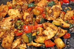 Full of Spicy Wok fired Chicken Breast, Zucchini, Red Bell Peppers and crunchy Peanuts in a Sesame Ginger-Garlic Sauce, this recipe is Authentically Panda Express! The recipe is straight from the source! http://archives.starbulletin.com/2007/01/17/features/story01.html BACK TO TOP art CRAIG T. KOJIMA / CKOJIMA@STARBULLETIN.COM Panda Express customer favorite Kung Pao Chicken. CLICK FOR LARGE Kung Pao Chicken is tasty, too No luck getting that Orange Chicken recipe, but Panda was willing to part with another of its top dishes. Kung Pao Chicken 1 pound boneless, skinless chicken breast, diced into 1/2-inch pieces, rinsed and drained 1 teaspoon cooking wine 2-½ tablespoons soy sauce ⅓ cup water 2-½ tablespoons vegetable oil, divided use 12 whole dry chili peppers (smaller than 3 inches; if longer, cut in half) ¼ cup diced green onion, white part only, in 1/2-inch pieces 1 teaspoon ground ginger 1 teaspoon ground garlic 1 teaspoon crushed red chili pepper ½ tablespoon cornstarch mixed with ½ tablespoon water 1 teaspoon sesame oil 2 ounces dry roasted peanuts » Marinade: ¼ cup water ½ teaspoon salt ½ egg ¼ cup cornstarch 2 tablespoons vegetable oil Combine marinade ingredients. Add chicken; refrigerate at least 1 hour. Combine wine, soy sauce and water; set aside. Heat wok on high heat 10 seconds. Add 2 tablespoons oil and heat well. Remove chicken from marinade and add to wok. Stir-fry quickly, 60 seconds. Remove chicken; drain well. Add chili peppers. Stir-fry until they darken. If wok becomes too dry, add ½ tablespoon vegetable oil. Add green onions, ginger, garlic and crushed red chili pepper. Stir-fry 5 seconds. Return chicken to wok; stir soy sauce/wine mixture and add; stir until sauce boils, then add cornstarch mix to thicken. Add sesame oil and peanuts. Stir and fold until ingredients are thoroughly mixed. Serves 3.