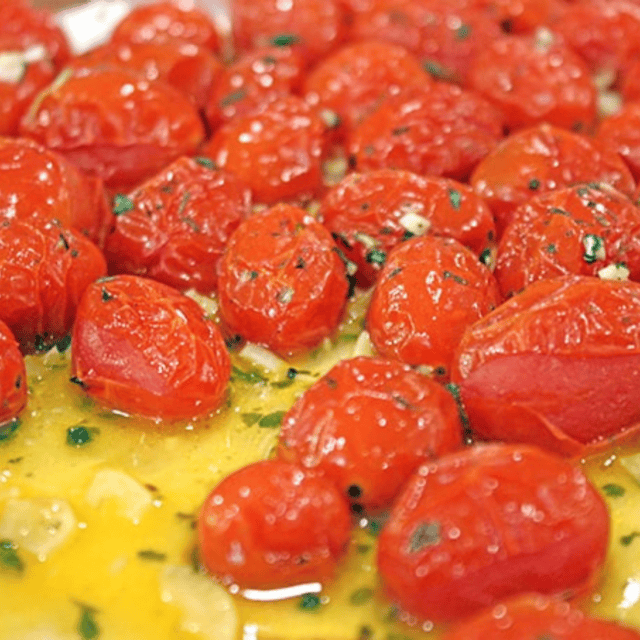 tomatoes on a baking sheet fresh out of the oven