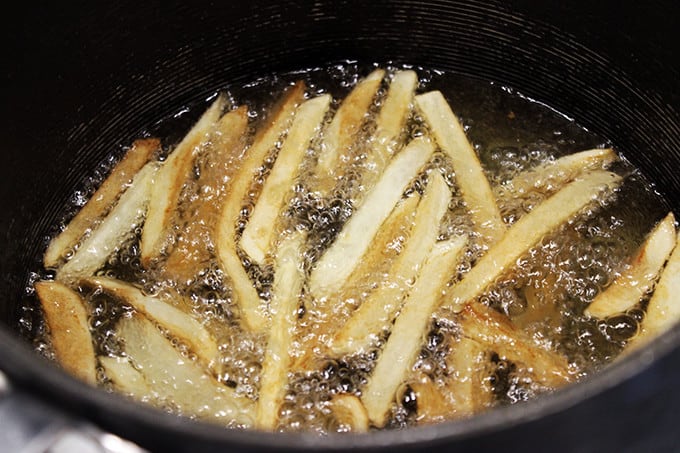 Animal-Style French Fries are fried golden brown, topped with melty American Cheese, buttery melted caramelized onions and a signature fry sauce. Serve with a fork or eat with your fingers if you dare, these fries are a cult favorite!