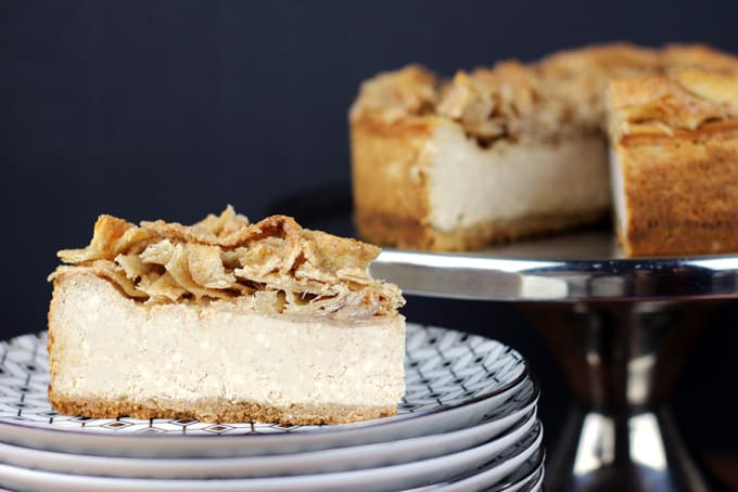 A tall, creamy, rich NY-Style Cinnamon Cheesecake topped with crispy, buttery, cinnamon sugar tortillas. This Cheesecake has it all, a rich taste with a hint of cinnamon spice topped with a crispy sweet crunch, it is a showstopper of a dessert!