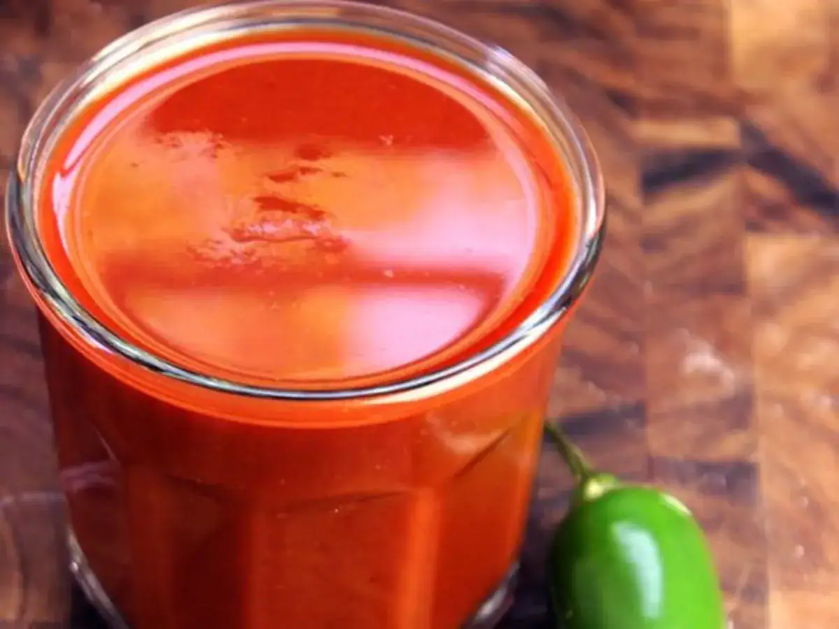 enchilada sauce in a glass container