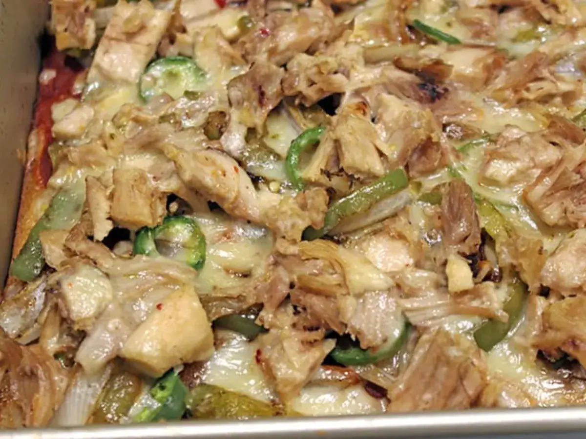 chicken and vegetables cooked on a sheet pan
