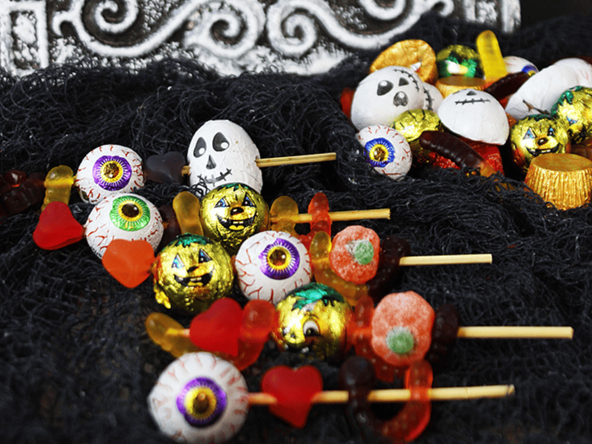 Candy skewers on a black fabric