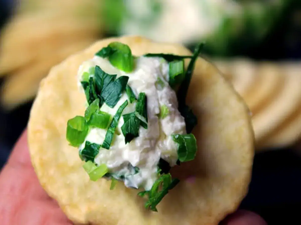cheese and jalapeños on a cracker