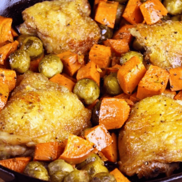 Cooked chicken thighs with vegetables