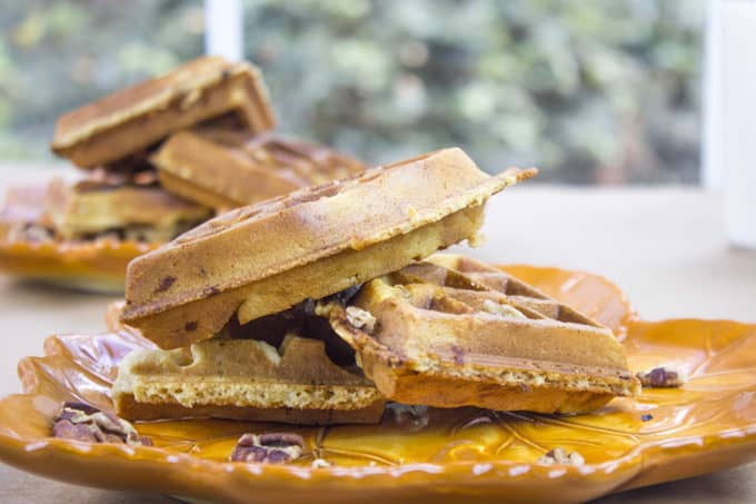 2 plates of waffles stacked 