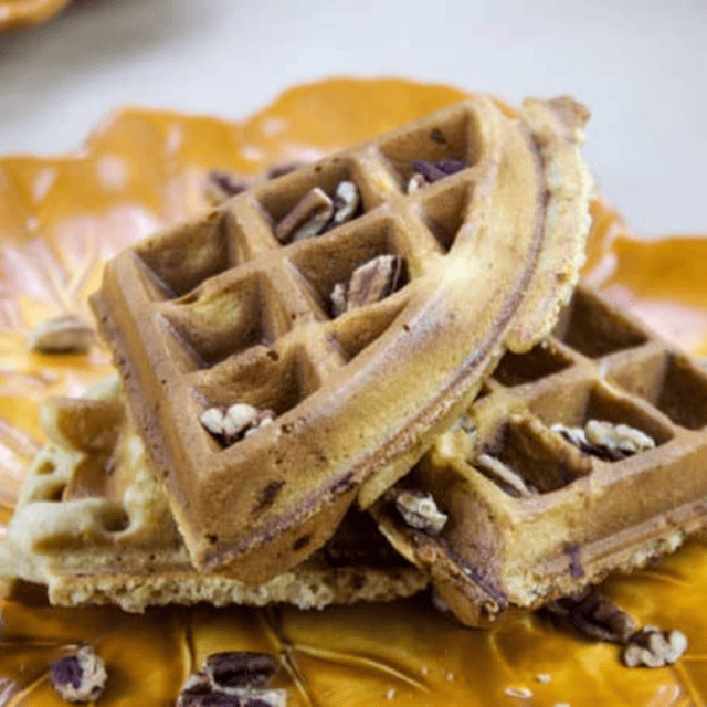 waffles stacked on top of each other on a festive plate