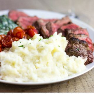 The perfect mashed potatoes to serve alongside your steak, ham or turkey in the holiday season and it makes enough for a crowd! Easily halved for smaller meals, this recipe is simple and open to your favorite add ins!
