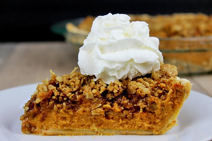 The only pie you'll need on your Thanksgiving dessert table, delicious Pumpkin pie with dark brown sugar topped with a Rich Pecan Streusel topping. Who says you need to choose pumpkin OR pecan pie?