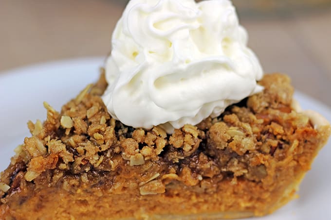 The only pie you'll need on your Thanksgiving dessert table, delicious Pumpkin pie with dark brown sugar topped with a Rich Pecan Streusel topping. Who says you need to choose pumpkin OR pecan pie?