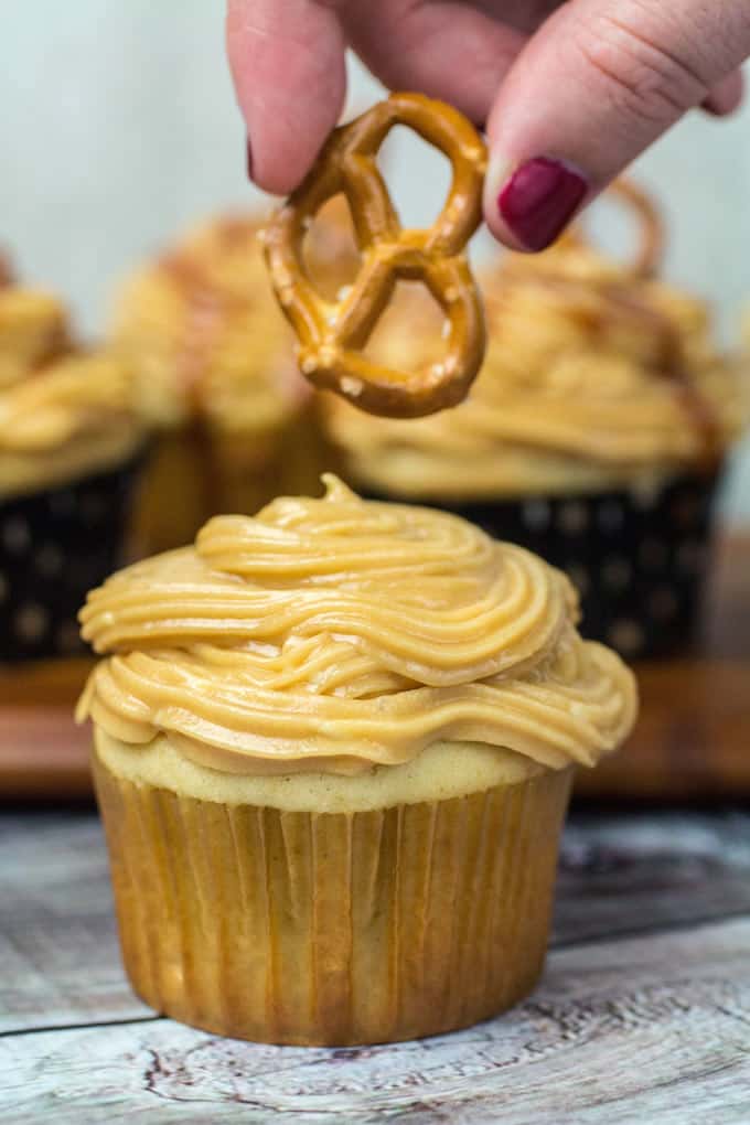 Gluten Free Salted Caramel Cupcakes are definitely for you. Homemade salted caramel sauce on top of a vanilla cupcake come together to form a sweet and buttery treat. These cakes are light, fluffy, and full of flavor. Best of all? They're gluten free!