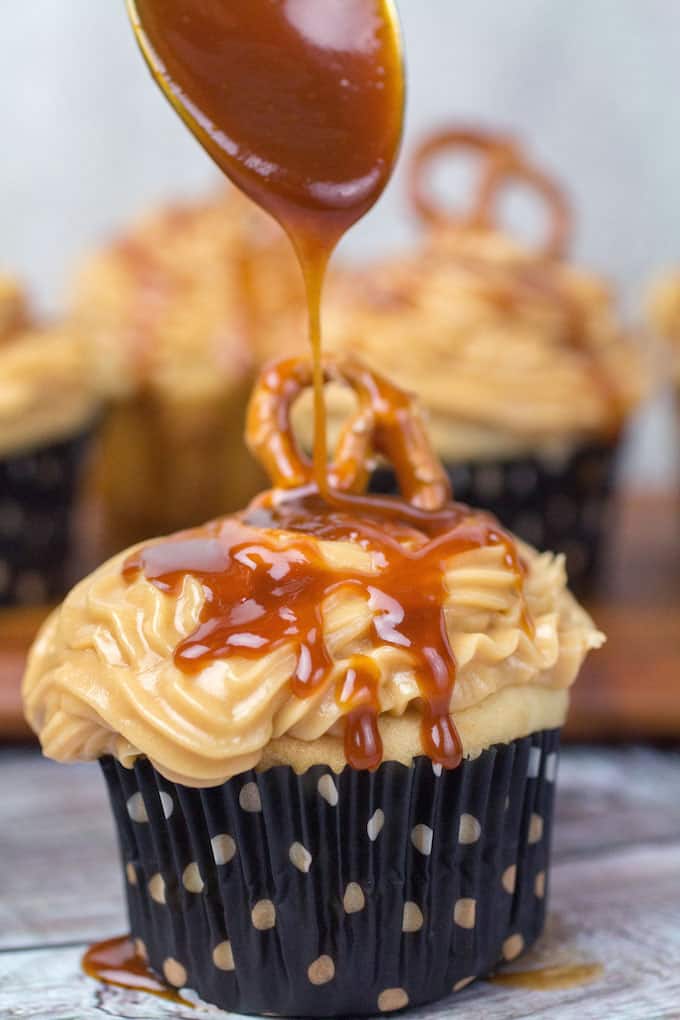 Gluten Free Salted Caramel Cupcakes are definitely for you. Homemade salted caramel sauce on top of a vanilla cupcake come together to form a sweet and buttery treat. These cakes are light, fluffy, and full of flavor. Best of all? They're gluten free!