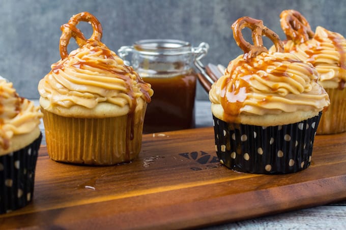 Gluten Free Salted Caramel Cupcakes are definitely for you. Homemade salted caramel sauce on top of a vanilla cupcake come together to form a sweet and buttery treat. These cakes are light, fluffy, and full of flavor. Best of all? They're gluten free!