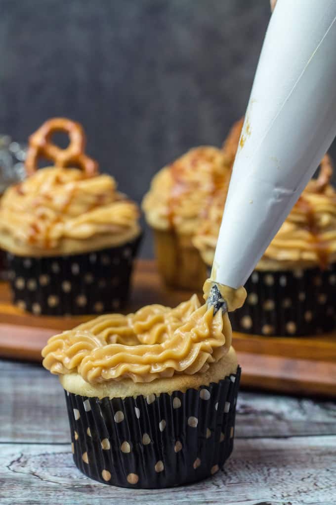 Gluten Free Salted Caramel Cupcakes are definitely for you. Homemade salted caramel sauce on top of a vanilla cupcake come together to form a sweet and buttery treat. These cakes are light, fluffy, and full of flavor. Best of all? They're gluten free!