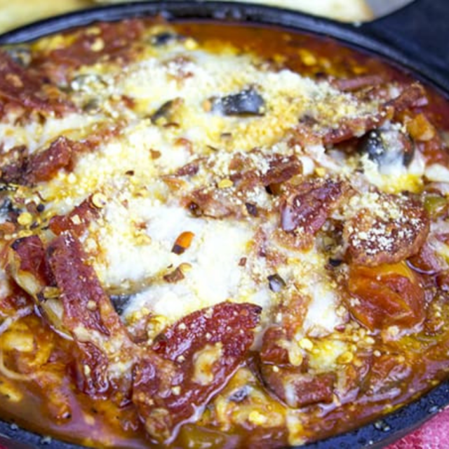 cast iron full of pizza dip