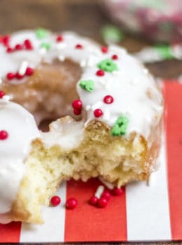 Classic Sour Cream Doughnuts fried to perfection with a classic powdered sugar glaze just like at Krispy Kreme! No yeast makes these doughnuts easy to make and with festive sprinkles a fantastic Holiday brunch/party treat!